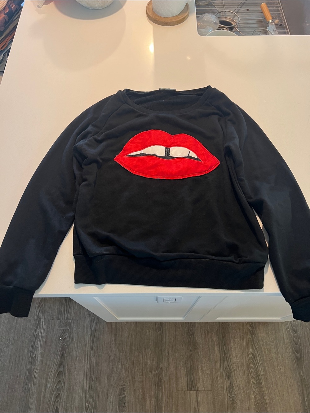 Black Women's Sweater with Red Lip Applique